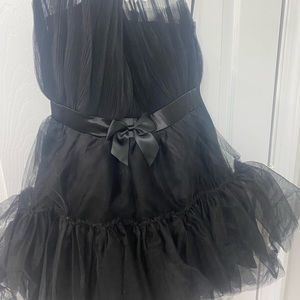 Flirty midi dress. Never worn. Prom, birthday or dinner dress. Zipper.